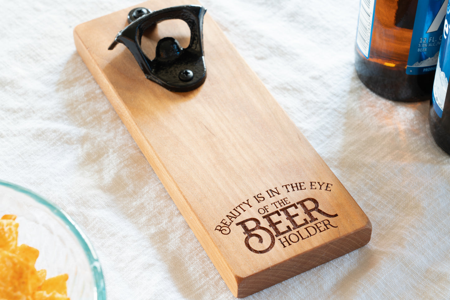 Beauty is in the eye of the beer holder magnetic bottle opener