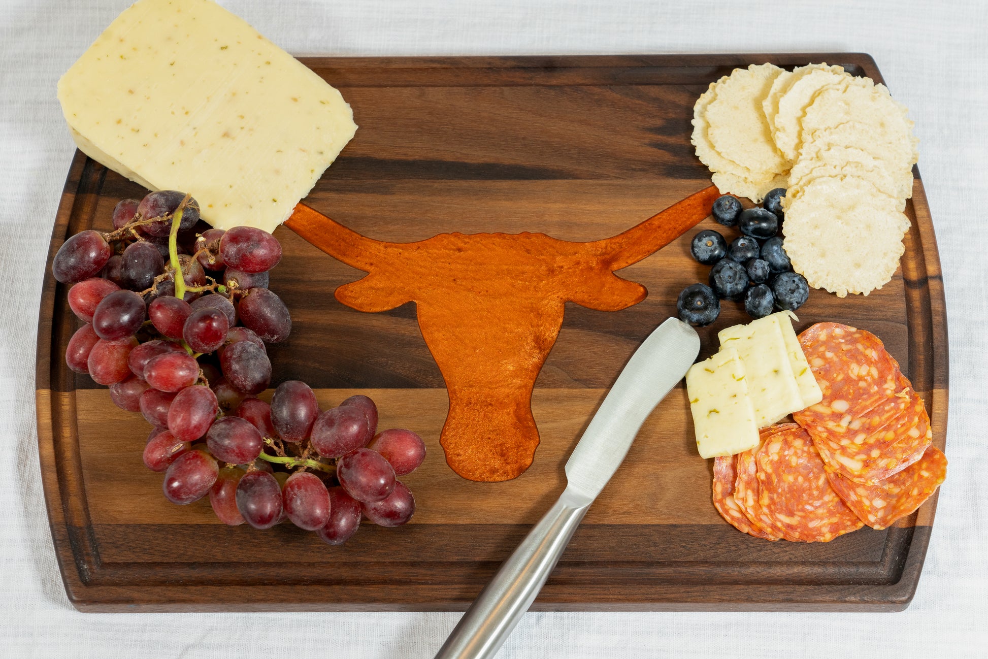 Officially Licensed Longhorns Charcuterie Board on Walnut