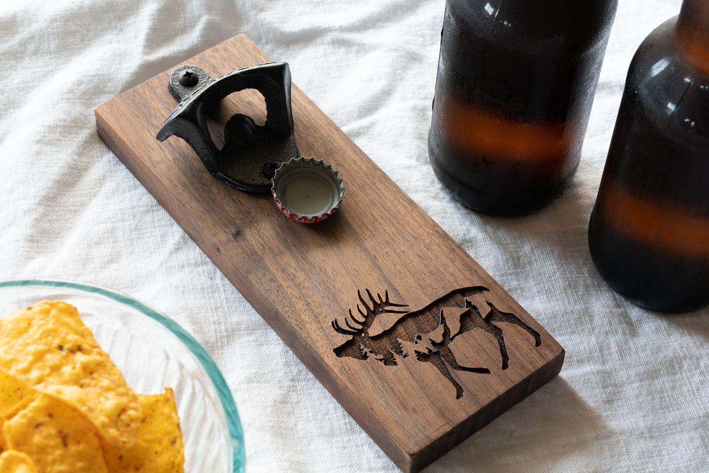 Elk Bottle Opener on Walnut